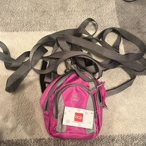 Kids ski harness with extra storage